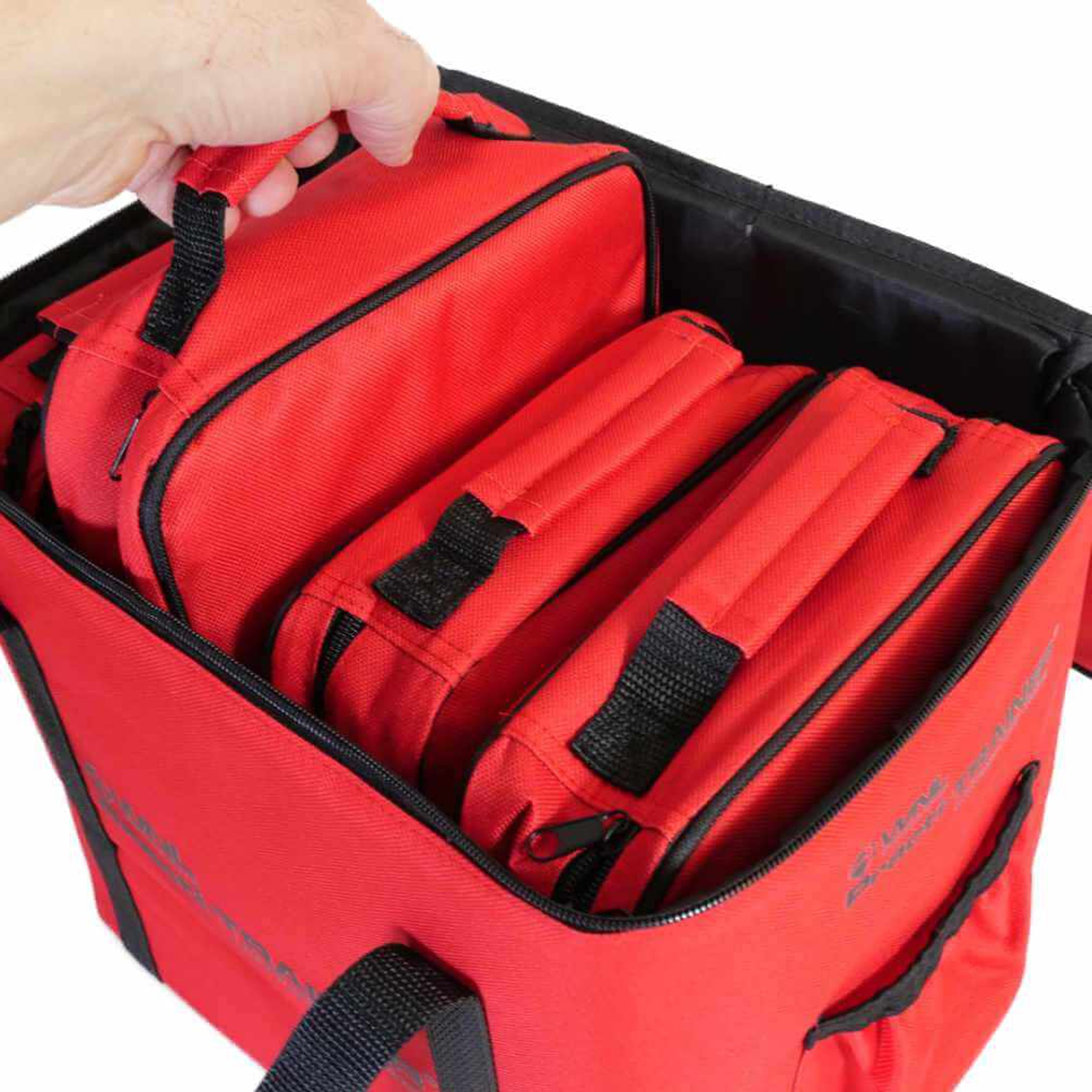 WNL AED trainer - Practi-Trainer-big carry bag with 4 single carry bags and hand pulling 1 out